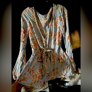 A “Billabong” a romper appealing to summer and any season vacations or outings!